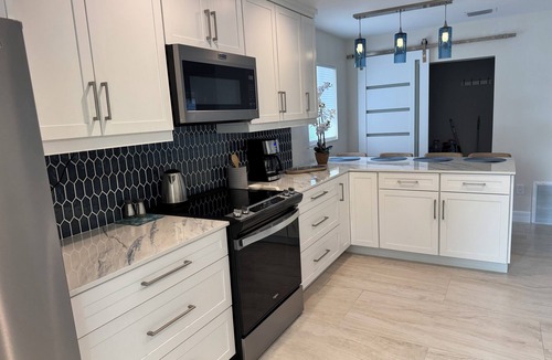 Mid Island House | Waterfront and a 5 minute walk to the beach. Mid-island on Fort Myers Beach!