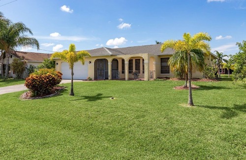 Fort Myers Villa | Waterfront Heated Pool Retreat with Dock Pet Friendly Sleeps 6 in Cape Coral