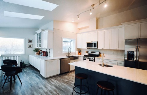 Tudor Area House | Wild About Anchorage · Hot Tub · Rooftop Patio · Chef's Kitchen · Coffee Bar