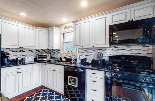 East Chop House | Wonderful three-story home with lovely decks, firepit, fast WiFi & washer/dryer
