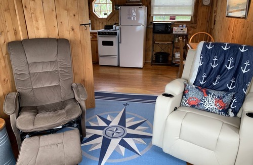Lubec Cottage | World's highest tides! Pet-friendly, bayfront cottage with a large fenced yard.