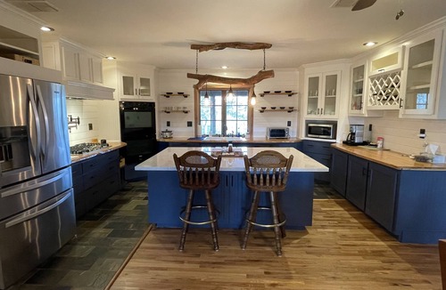 Brenham House | Your 12 Acre Farmhouse Retreat - Relax and Unwind by the Campfire and Pond