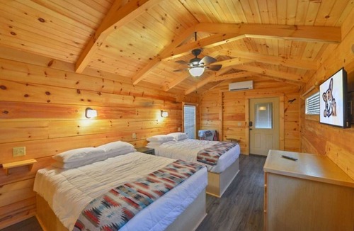 Bryan Cabin | Your Home Away From Home! Patio, Outdoor Pool, Pets are Allowed Here!