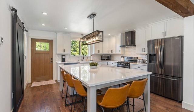 Amazing new construction in this beautiful home, walk to Rodger Wheeler Beach.