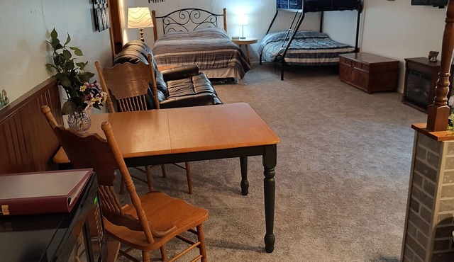 Beautiful cabin situated on wooded land with nice yard clearing and small stream