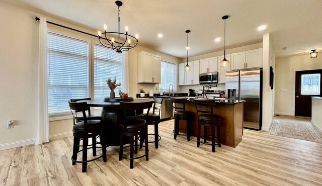 Beautiful NEW Ranch Home with a large deck & games