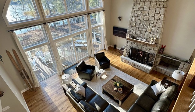 Beautiful waterfront home on quiet cove on Moose Pond. Perfect for 1-2 families