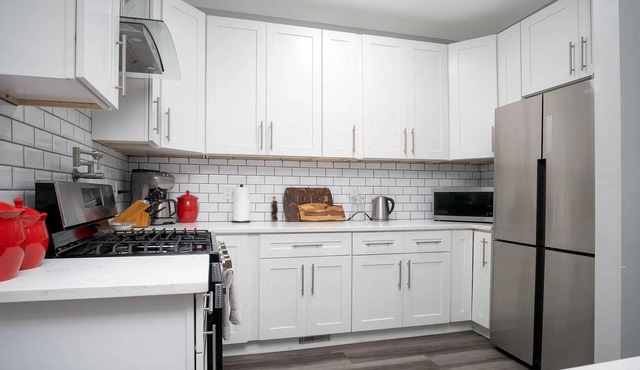 Charming 4 Bedroom Home Near Downtown Columbus with Garage Parking and Backyard.