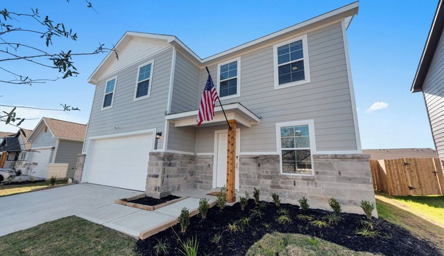 Charming 4-bedroom house with movie room, game room, outdoor patio + fire pit