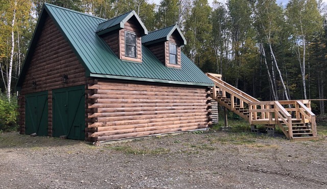 Charming cabin in wonderful New Sweden with 80 acres of woods and trails