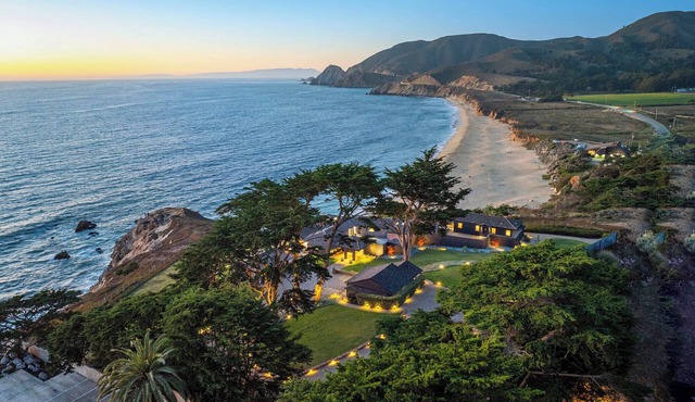 Distinguished Oceanfront Point Estate with Iconic Beach + Mountain Vistas