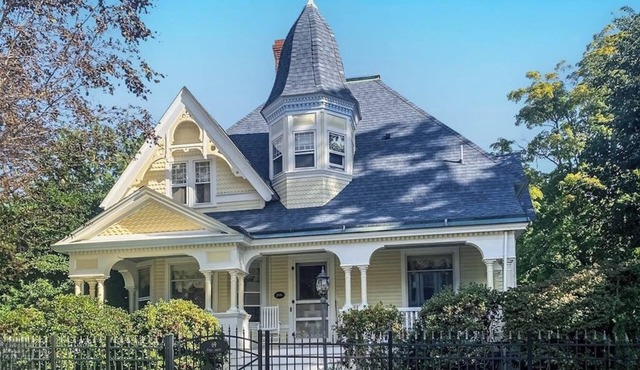 Dog-friendly historical home with recent updates, porch & prime in-town location