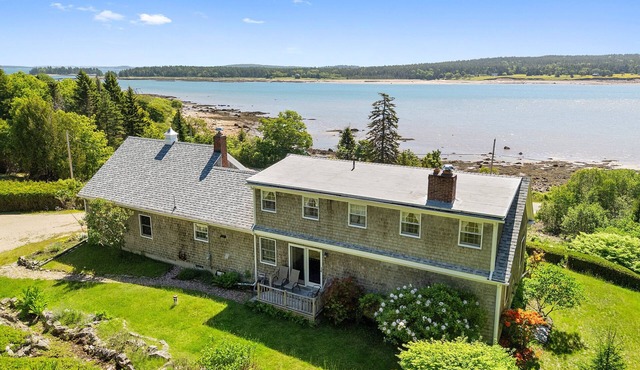 Dog-friendly oceanfront home with private shorefront, two fireplaces, & firepit