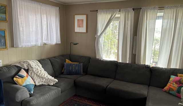 Enjoy channel views from the hot tub. Minutes walk from downtown and waterfront.