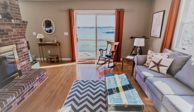 Enjoy the stunning views while relaxing on the deck at East Ledge Cottage