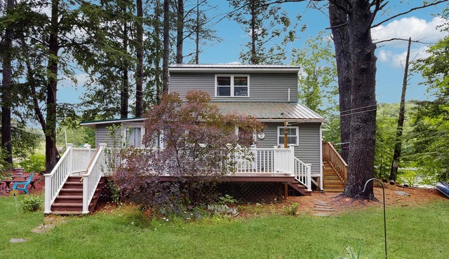 Entire lakefront home on Togus Pond with decks, canoe, firepit & great view
