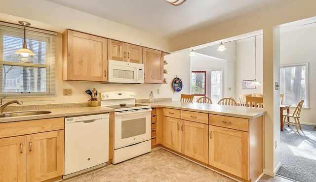 Free Golf at Bear Trap Dunes and MORE! Bright and cheery house only a short walk to the beach! Some features include 3 bedrooms plus den, 2 baths
