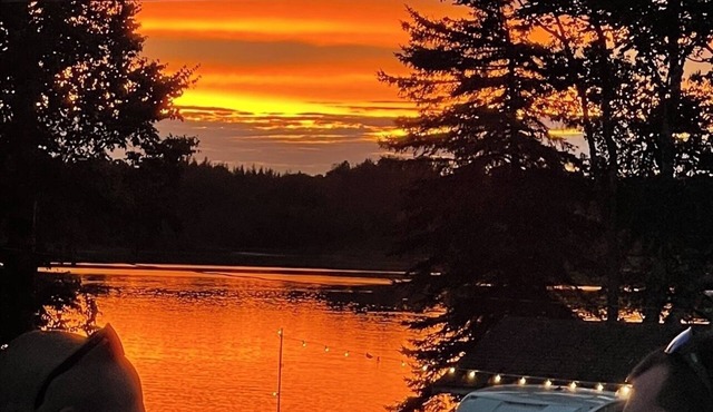 Island Falls, ME- off I-95 -In town- restaurants, comfortable all season.