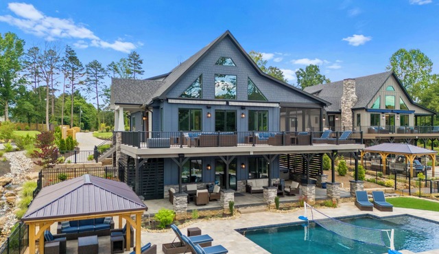 Luxe Lakefront Lodge w/Pool, Hot Tub, Theater & Private Dock | Sleeps 21