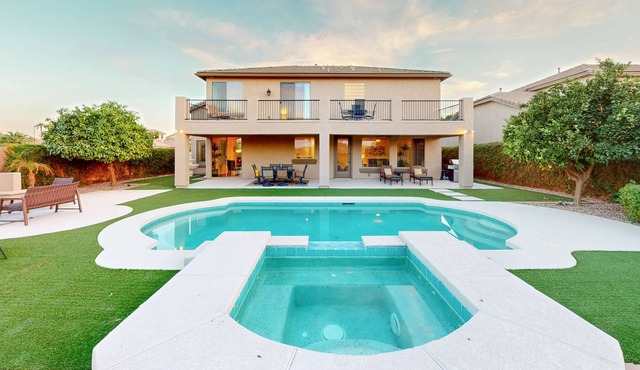 Luxe snowbird-friendly haven with heated pool, gas fireplace, balcony, & firepit