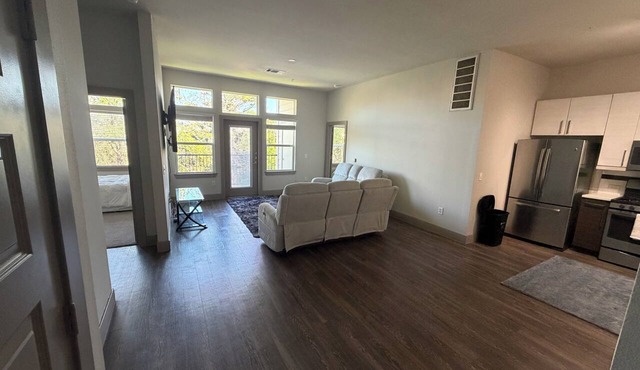 Modern 2BR Bayou Retreat . Pool . Gym . Balcony