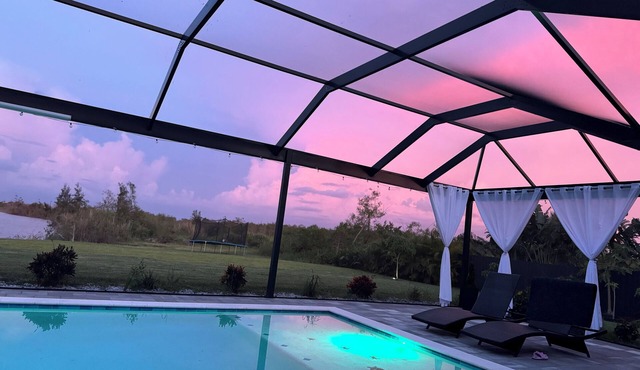 NEW The Spectacular Sunrise Lake View, Beautiful Home with Heater Salt pool.