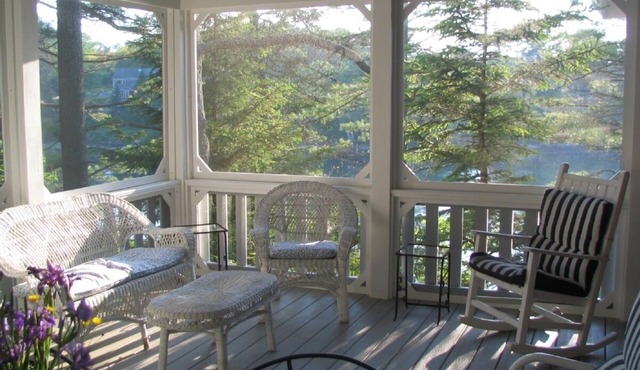 Oceanfront Juniper Point Cottage with dock, screened porch, close boat traffic