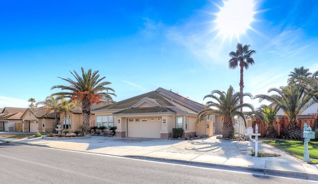 OPEN FLOOR PLAN WITH SIDEYARD PARKING AND WONDERFUL REAR DECK WITH OVERHANG