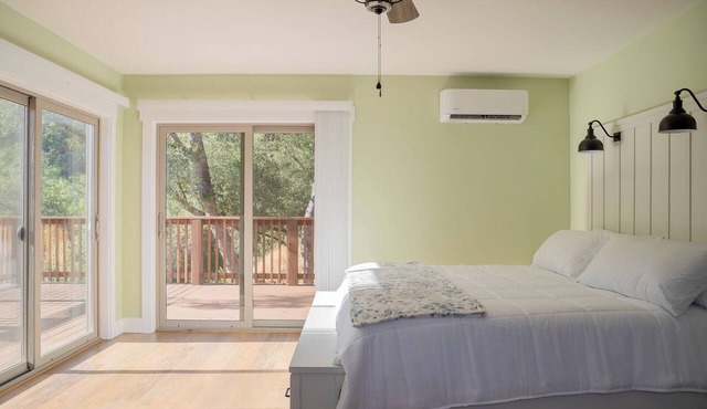 Private 40-acre retreat with creek, swimming hole, hot tub, fire pit, sleeps 19, dog-friendly, near golf & casinos.