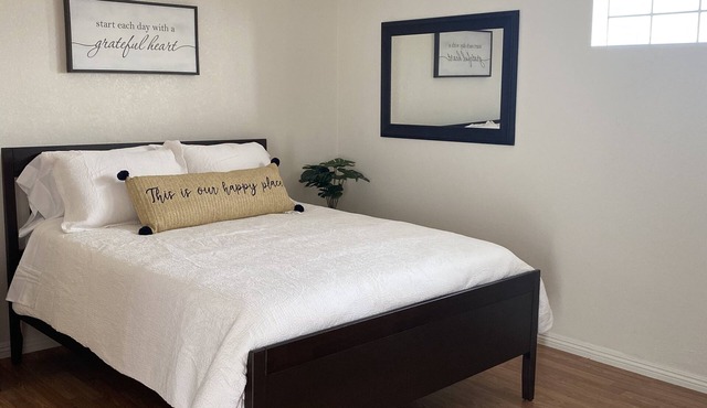 Private Studio with private entrance includes driveway parking space.