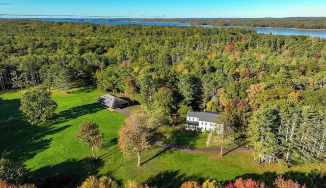 Renovated farmhouse on an acreage with grill, four-bedrooms, & W/D - river views