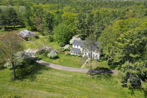 Renovated farmhouse on an acreage with grill, four-bedrooms, & W/D - river views
