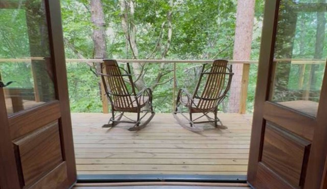 Riverfront A-frame cabin in the woods - minutes from downtown Greenville in Greenville