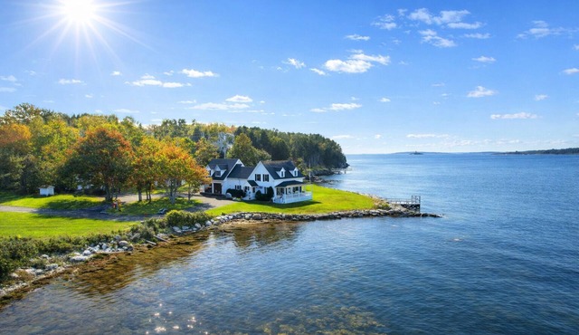Situated at the waters edge with picturesque sunset views to Mt Washington.