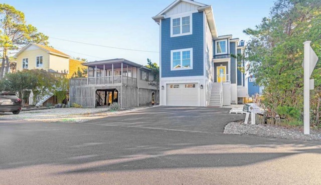 Town of Bethany Beach home with a fireplace & outdoor living - near beach