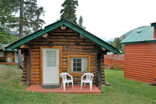 Traditional Log Cabin with Large Windows on the Kenai Peninsula, Alaska