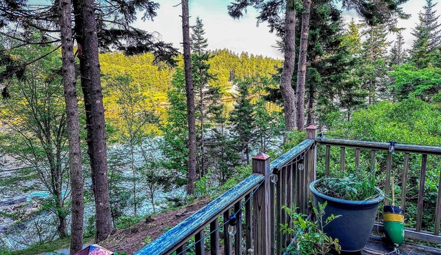 Tranquil Ocean view home with a washer & dryer and a relaxing Deck