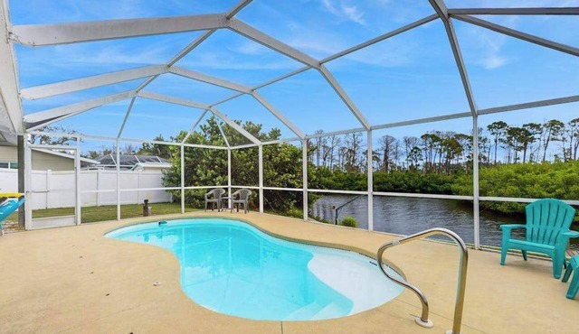 Waterfront & ground-floor home with free WiFi, dock, pool, & central AC